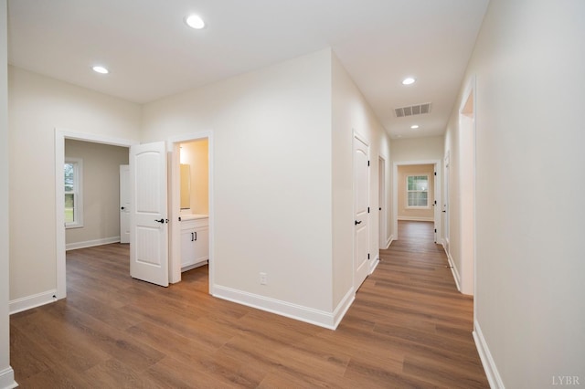 1750 Willow Oak Dr, Forest, VA 24551 - hall featuring wood finished floors, visible vents, and plenty of natural light