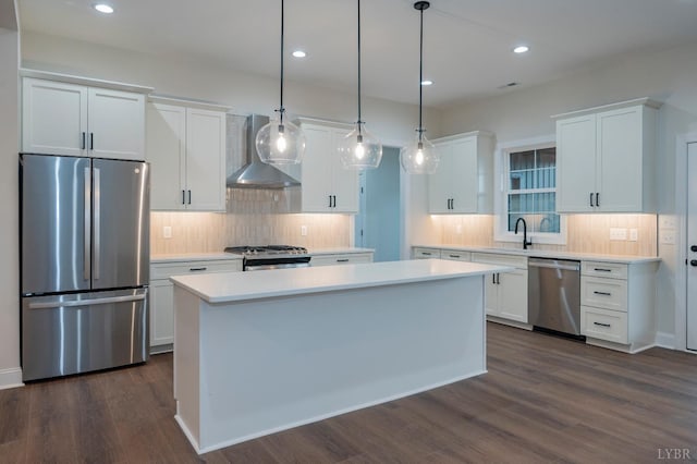 1750 Willow Oak Dr, Forest, VA 24551 - kitchen featuring tasteful backsplash, stainless steel appliances, white cabinets, dark wood-style flooring, and wall chimney exhaust hood