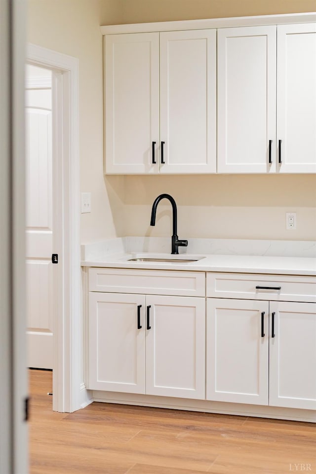 1750 Willow Oak Dr, Forest, VA 24551 - bar with light wood-style floors and a sink
