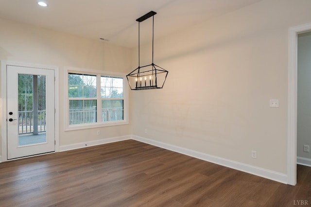 1750 Willow Oak Dr, Forest, VA 24551 - unfurnished dining area featuring dark wood-style floors, baseboards, an inviting chandelier, and recessed lighting