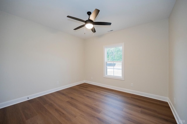 1750 Willow Oak Dr, Forest, VA 24551 - spare room featuring baseboards, visible vents, ceiling fan, and dark wood-style flooring