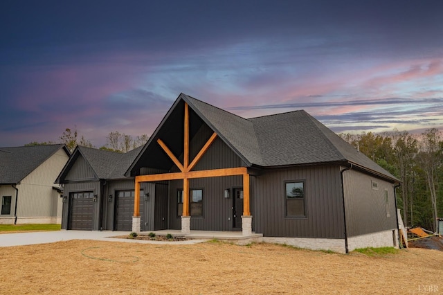 1750 Willow Oak Dr, Forest, VA 24551 - modern inspired farmhouse with roof with shingles, covered porch, concrete driveway, and a garage