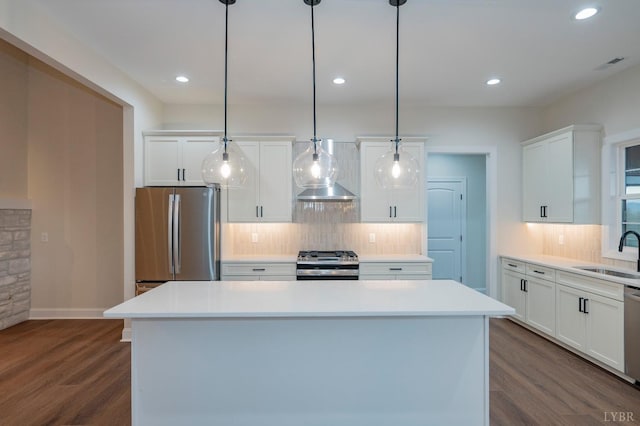 1750 Willow Oak Dr, Forest, VA 24551 - kitchen featuring a sink, dark wood-style flooring, stainless steel appliances, a center island, and wall chimney range hood