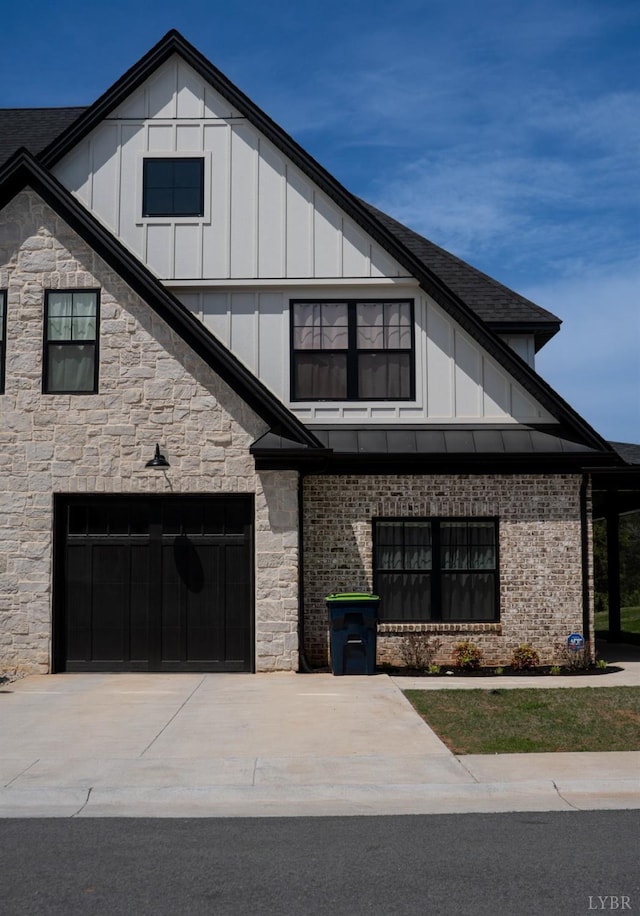 1022 N Westyn Loop, Forest, VA 24551 - view of front facade with board and batten siding, concrete driveway, stone siding, roof with shingles, and an attached garage