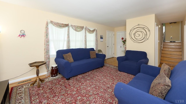 139 Old Main St, Brookneal, VA 24528 - living area with stairs and wood finished floors