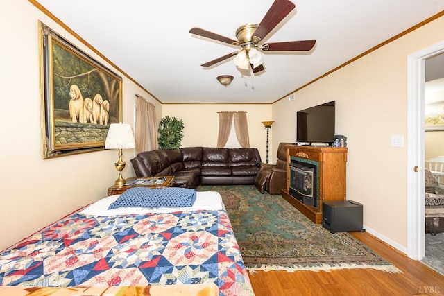 139 Old Main St, Brookneal, VA 24528 - living area featuring ceiling fan, wood finished floors, and crown molding