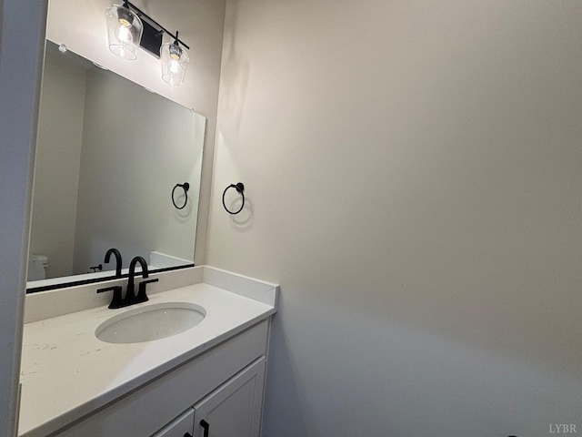 half bathroom with vanity