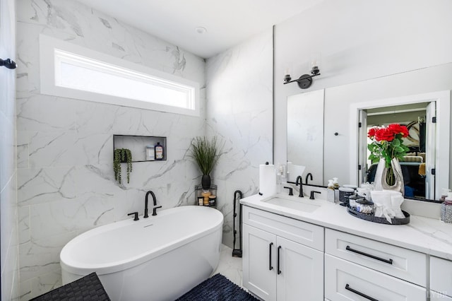 301 Bentley Grove Way, Lynchburg, VA 24502 - full bath featuring a freestanding bath, vanity, marble finish floors, and tile walls