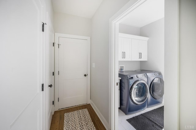 301 Bentley Grove Way, Lynchburg, VA 24502 - laundry room featuring washing machine and dryer, light wood-style flooring, and cabinet space