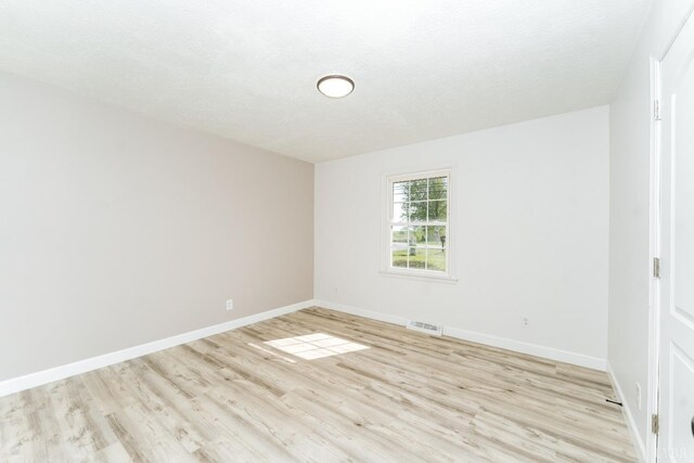 3677 Grit Rd, Hurt, VA 24563 - empty room featuring light wood-type flooring and baseboards
