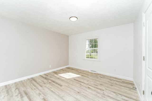 3677 Grit Rd, Hurt, VA 24563 - unfurnished room with light wood-style floors and baseboards