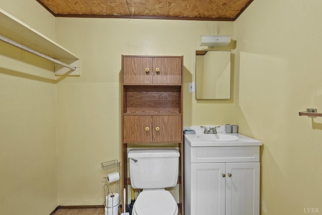 119 Adams Dr, Lynchburg, VA 24502 - bathroom with toilet, vanity, and baseboards