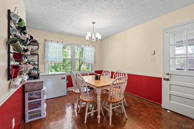 119 Adams Dr, Lynchburg, VA 24502 - dining room with a chandelier and a textured ceiling
