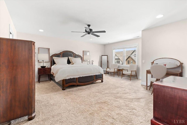 bedroom with recessed lighting, a ceiling fan, and carpet