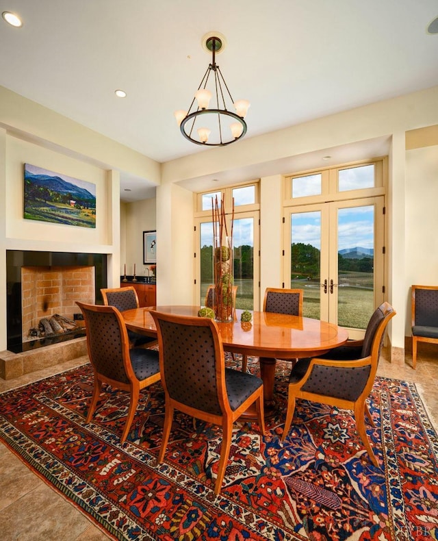 1209 Sycamore Creek Dr, Goode, VA 24556 - dining space featuring recessed lighting, a chandelier, french doors, and a fireplace