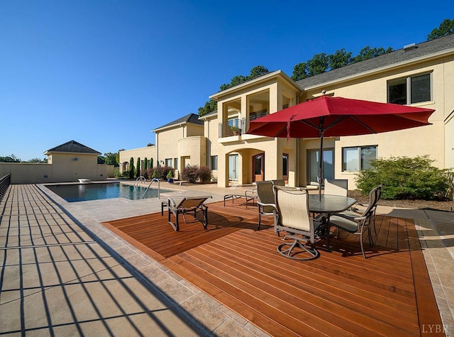 1209 Sycamore Creek Dr, Goode, VA 24556 - exterior space with a patio, outdoor dining area, and a diving board