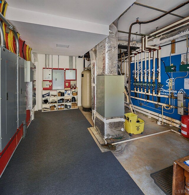 1209 Sycamore Creek Dr, Goode, VA 24556 - utilities featuring heating unit, electric panel, and gas water heater