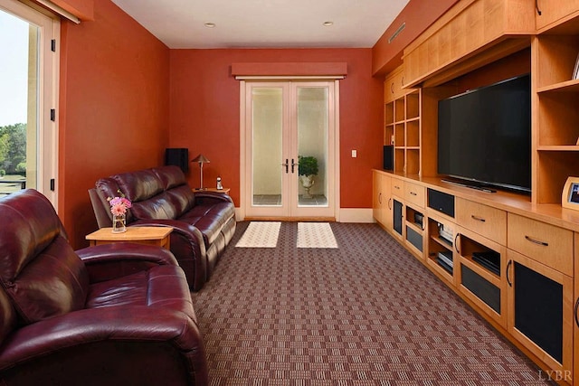1209 Sycamore Creek Dr, Goode, VA 24556 - living room featuring built in features, baseboards, french doors, and dark carpet