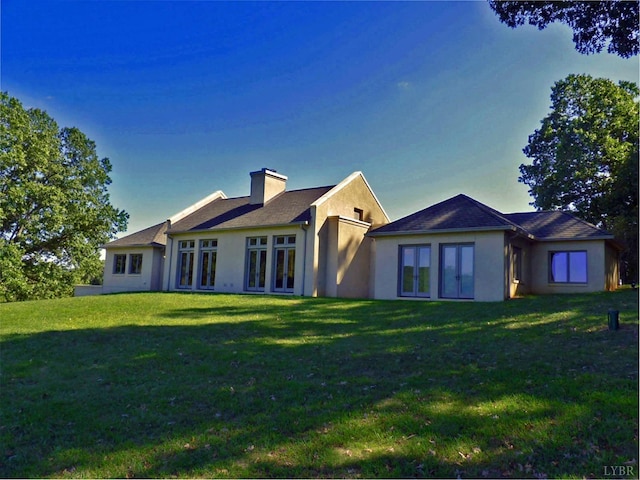 1209 Sycamore Creek Dr, Goode, VA 24556 - rear view of house with a yard, stucco siding, french doors, and a chimney