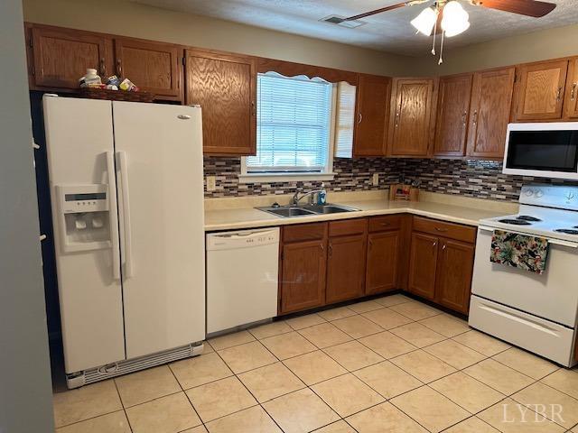 301 Gooseneck Ct, Forest, VA 24551 - kitchen featuring white appliances, a sink, light countertops, and ceiling fan