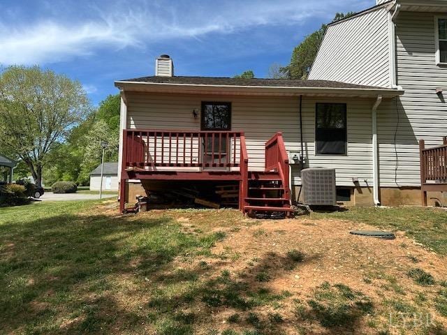 301 Gooseneck Ct, Forest, VA 24551 - back of house with a wooden deck, a lawn, and a chimney