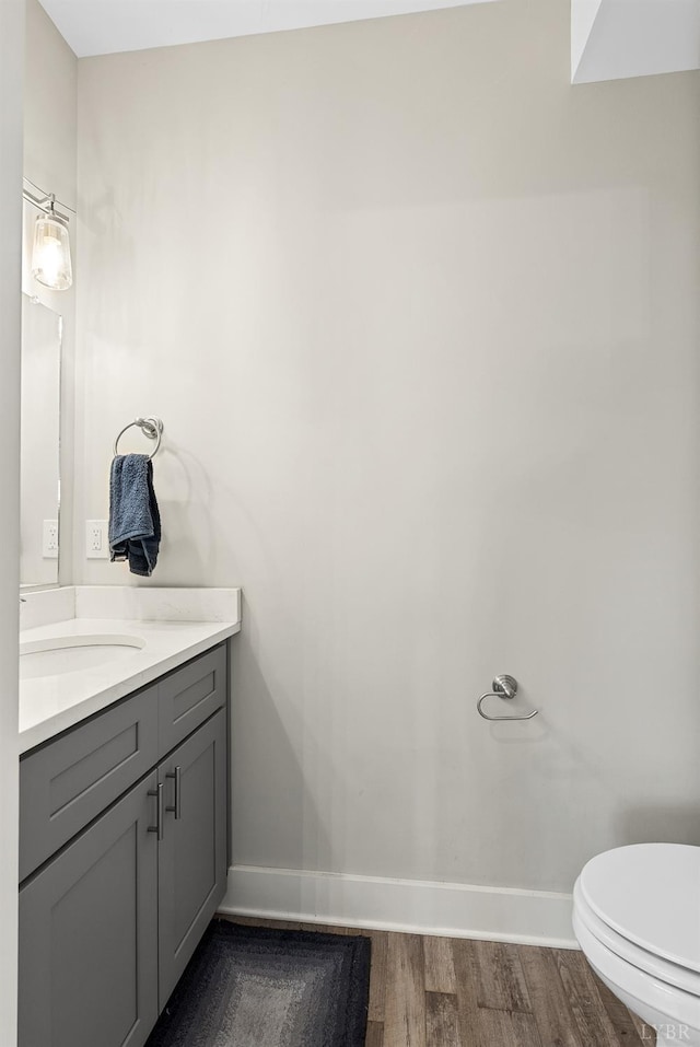21 Zags Ln, Lynchburg, VA 24502 - bathroom with wood finished floors, baseboards, vanity, and toilet