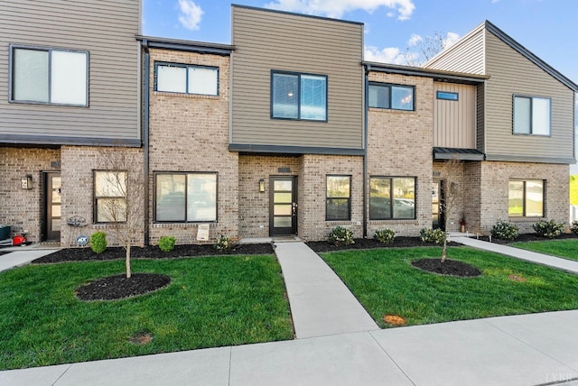 21 Zags Ln, Lynchburg, VA 24502 - view of property with brick siding and a front yard