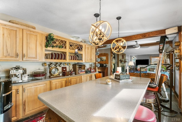 106 Catlett Ct, Moneta, VA 24121 - kitchen featuring a chandelier, a kitchen bar, a center island, pendant lighting, and ceiling fan