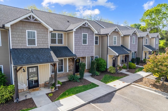 1057 Casley Way, Forest, VA 24551 - multi unit property featuring stone siding, roof with shingles, and a residential view
