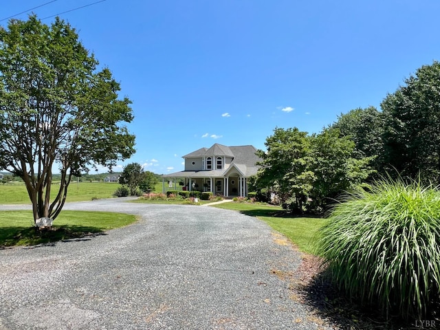216 Burford Farm Rd, Monroe, VA 24574 - view of front of home with a front lawn, a porch, and curved driveway