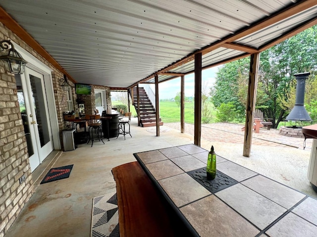 216 Burford Farm Rd, Monroe, VA 24574 - view of patio with outdoor dining area, stairway, a fire pit, and french doors
