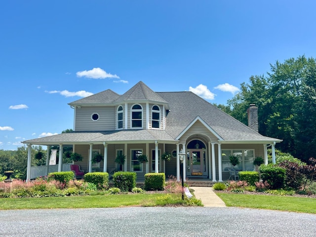 216 Burford Farm Rd, Monroe, VA 24574 - victorian-style house with covered porch and a chimney