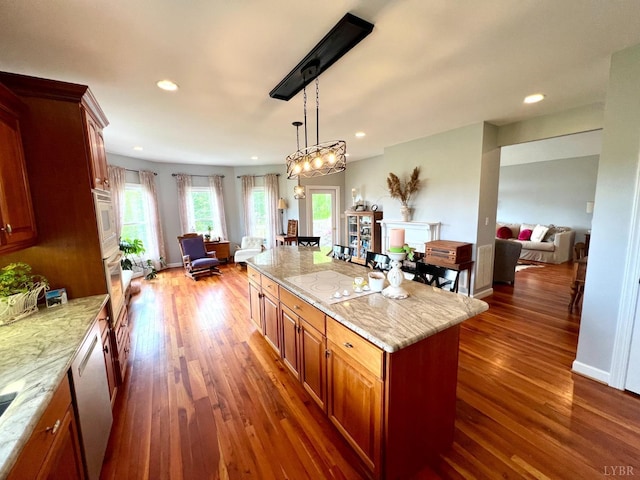 216 Burford Farm Rd, Monroe, VA 24574 - kitchen featuring white appliances, light stone countertops, dark wood finished floors, and recessed lighting