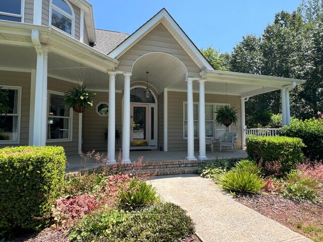 216 Burford Farm Rd, Monroe, VA 24574 - property entrance featuring a porch and roof with shingles