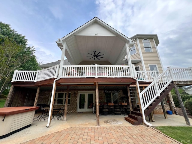 216 Burford Farm Rd, Monroe, VA 24574 - back of property with french doors, a wooden deck, brick siding, a patio area, and a ceiling fan