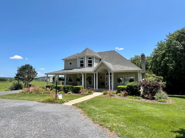 216 Burford Farm Rd, Monroe, VA 24574 - victorian home featuring a front yard and a porch