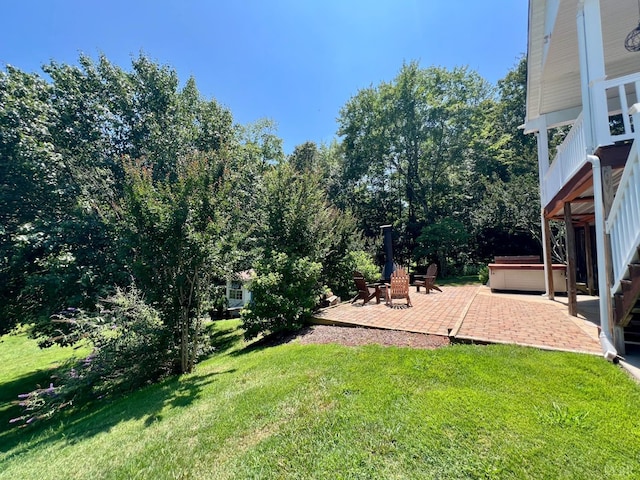 216 Burford Farm Rd, Monroe, VA 24574 - view of grassy yard with a hot tub and a patio area