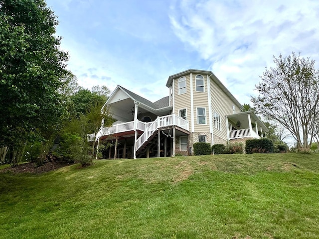 216 Burford Farm Rd, Monroe, VA 24574 - rear view of house featuring ceiling fan, stairs, a yard, and a deck