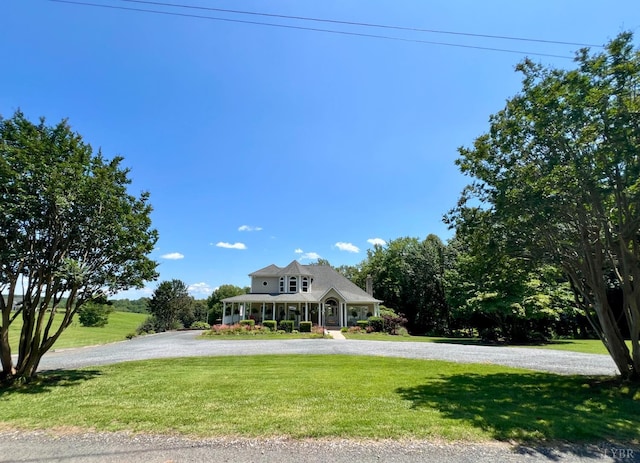 216 Burford Farm Rd, Monroe, VA 24574 - view of front of house featuring a front lawn, curved driveway, and covered porch