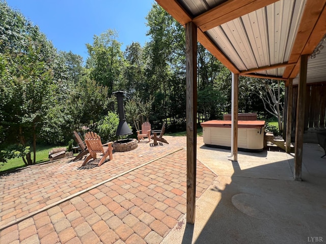 216 Burford Farm Rd, Monroe, VA 24574 - view of patio / terrace with an outdoor fire pit and a hot tub