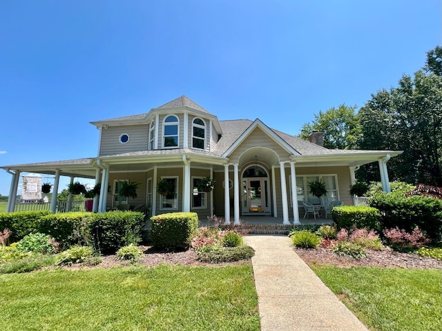 216 Burford Farm Rd, Monroe, VA 24574 - view of front of house with covered porch, a chimney, and a front lawn