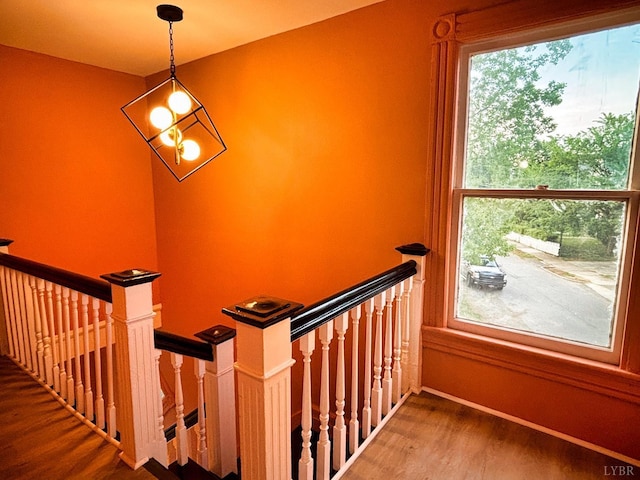850 Rivermont Ave, Lynchburg, VA 24504 - stairway with wood finished floors, healthy amount of natural light, a chandelier, and baseboards