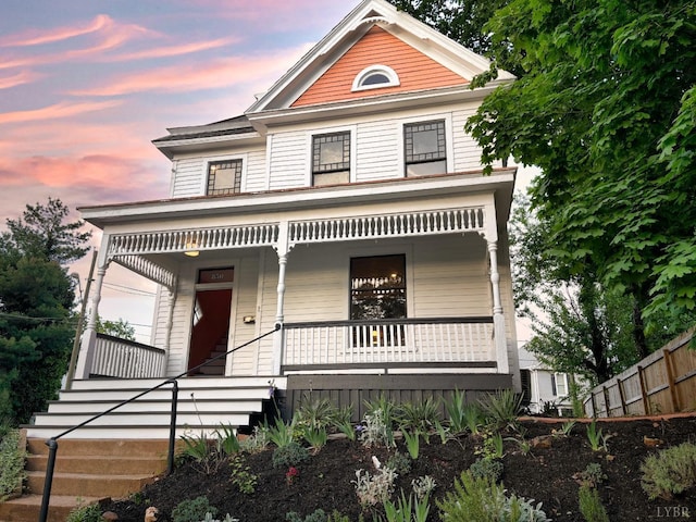 850 Rivermont Ave, Lynchburg, VA 24504 - victorian-style house featuring a porch, fence, and stairs