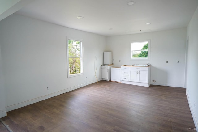 607 N St, Bedford, VA 24523 - spare room featuring plenty of natural light, recessed lighting, baseboards, and dark wood-style floors