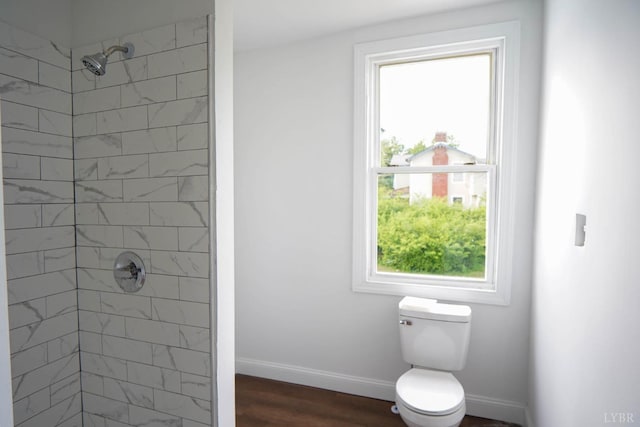 607 N St, Bedford, VA 24523 - bathroom featuring plenty of natural light, toilet, and tiled shower