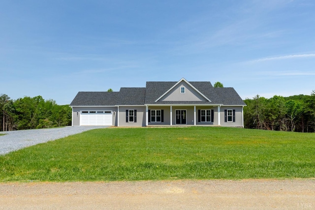243 Pebble Rd, Rustburg, VA 24588 - view of front facade featuring a garage, a front yard, and driveway