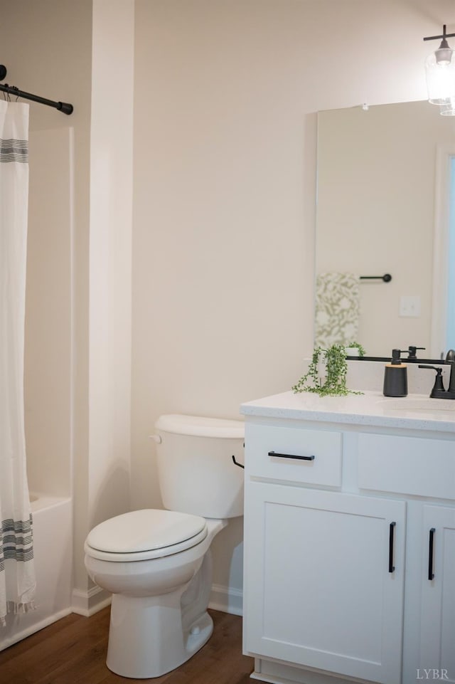 128 Brenleigh Ct Unit 108, Lynchburg, VA 24501 - full bath with vanity, wood finished floors, toilet, shower / tub combo, and baseboards