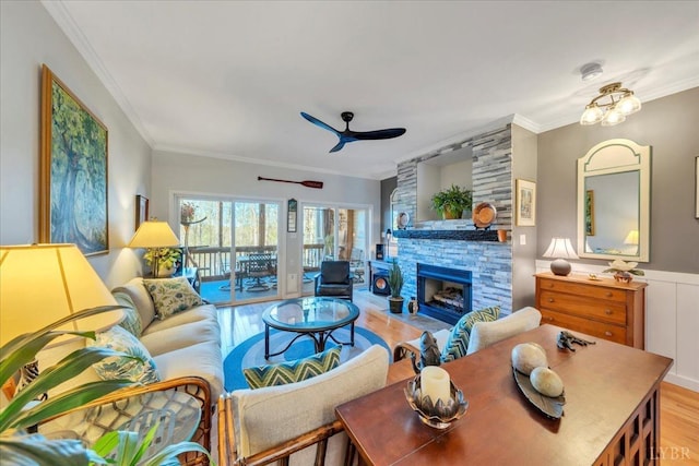 231 Mountain Cove Dr Unit 5, Hardy, VA 24101 - living room featuring wood finished floors, crown molding, ceiling fan, and a fireplace