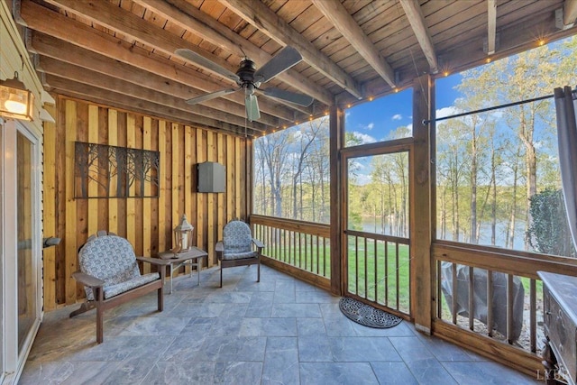 231 Mountain Cove Dr Unit 5, Hardy, VA 24101 - sunroom / solarium with a ceiling fan, a water view, beamed ceiling, and view of wooded area