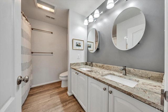 231 Mountain Cove Dr Unit 5, Hardy, VA 24101 - full bathroom featuring double vanity and wood finished floors